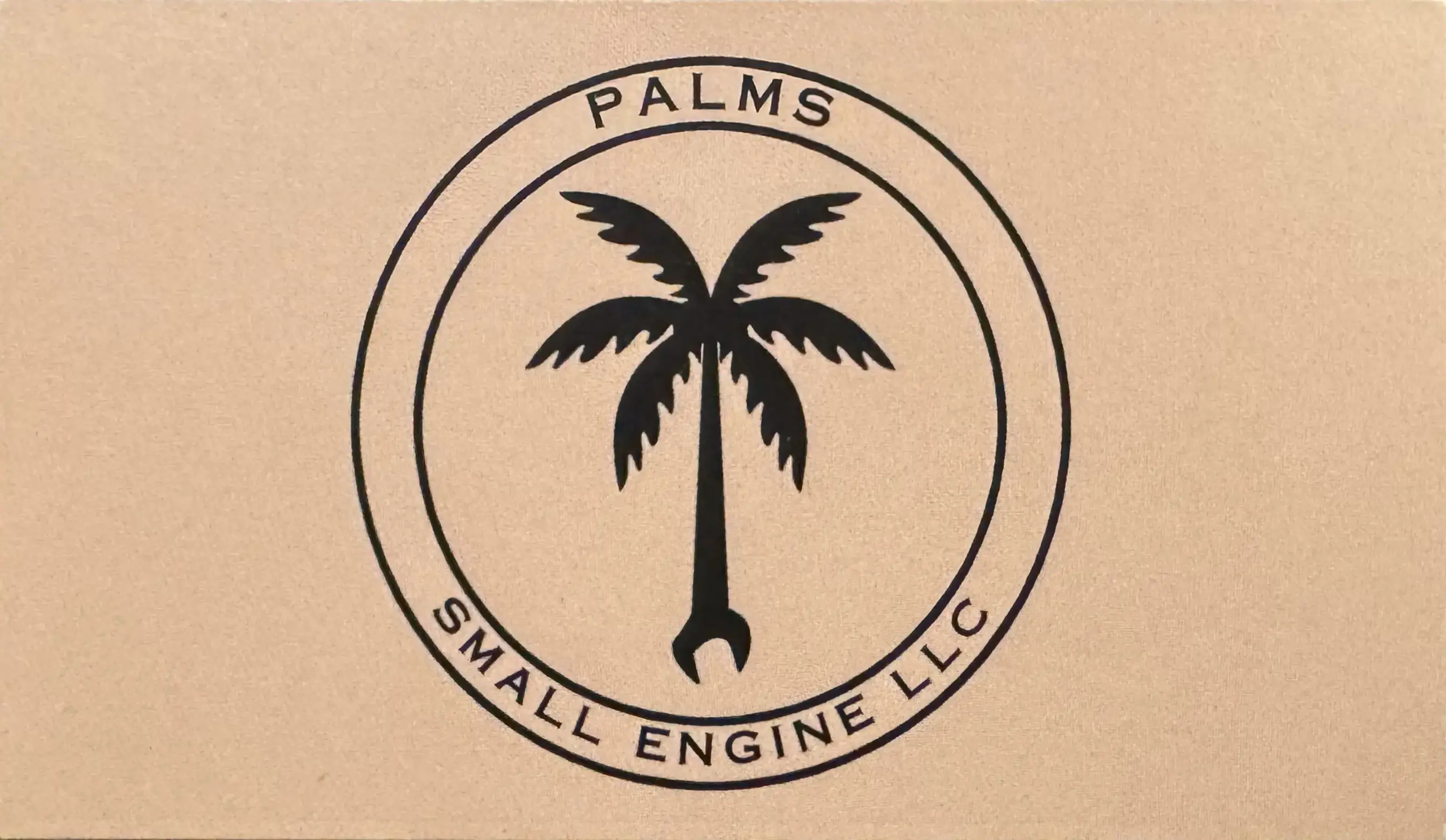 The front of Kevin Griffin's business card for his company, Palm's Small Engine.
